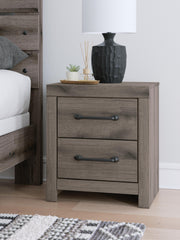 Graystorm Queen Panel Bed, Dresser, Mirror, Chest and Nightstand in Brown Gray - PKG021352