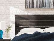 Hollivern Queen Panel Bed, Dresser, Mirror, Chest and 2 Nightstands in Dark Gray - PKG021608