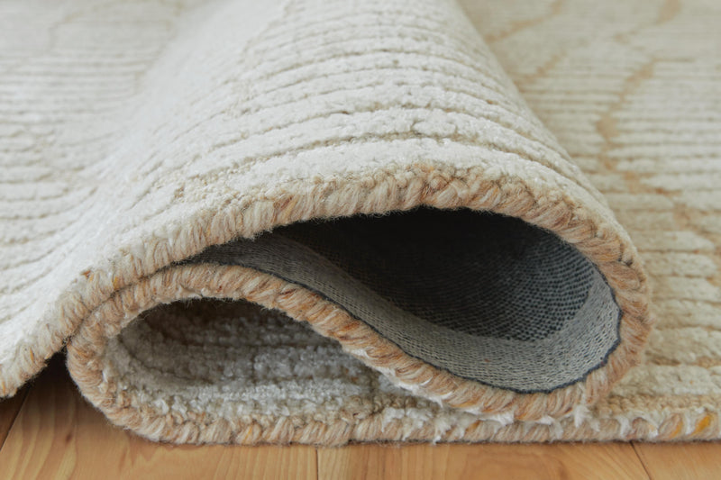 Jaseena Beige/Tan 7'8" x 10' Area Rug - R407721
