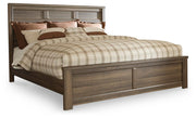 Juararo Dark Brown King Panel Bed and 2 Nightstands - B251B45