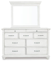 Kanwyn Whitewash Cal King Upholstered Panel Bed, Dresser, Mirror and Chest - B777B23