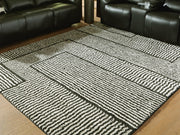 Kurtmen Black/Ivory 7'10" x 9'10" Area Rug - R407591