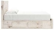 Lawroy King Panel Storage Bed with Mirrored Dresser and Nightstand in Light Natural from Ashley - Lara Furniture