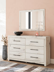 Lawroy Queen Panel Storage Bed with Mirrored Dresser and 2 Nightstands in Light Natural from Ashley - Lara Furniture