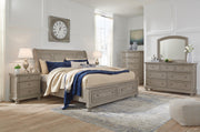Lettner King Sleigh Bed with 2 Storage Drawers and Dresser in Light Gray - PKG006601