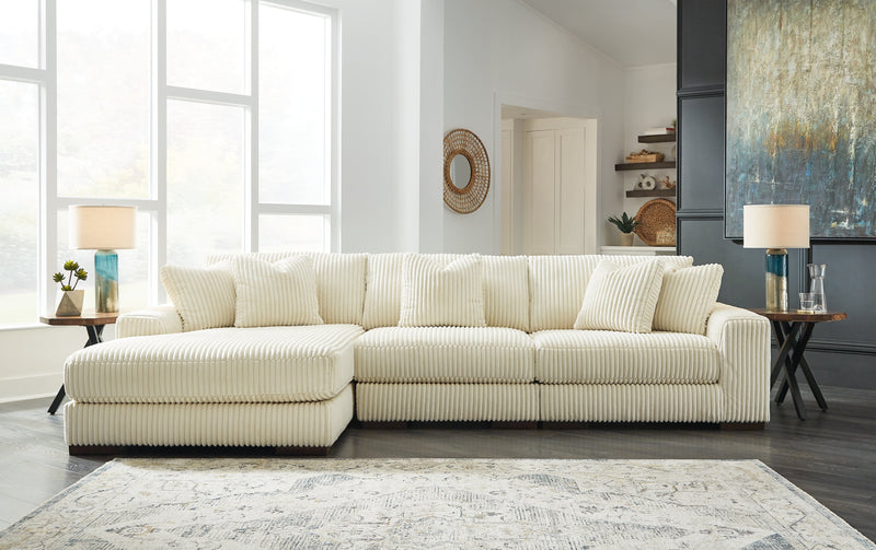 Lindyn Ivory 3-Piece Sectional with Ottoman from Ashley - Lara Furniture