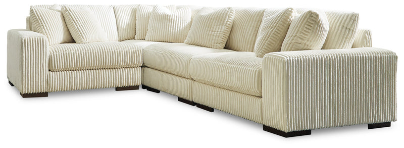 Lindyn Ivory 4-Piece Sectional with Ottoman from Ashley - Lara Furniture