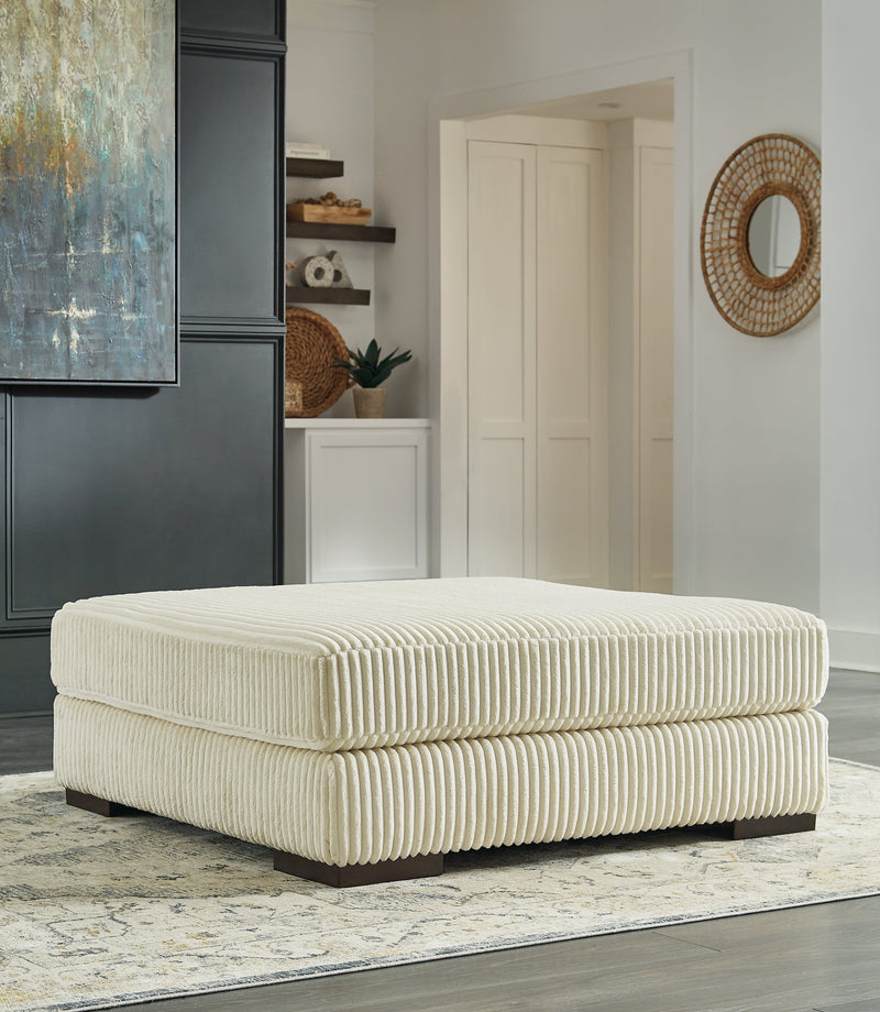 Lindyn Ivory 6-Piece Sectional with Ottoman from Ashley - Lara Furniture