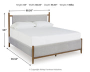 Lyncott California King Upholstered Bed with Dresser and 2 Nightstands in Brown from Ashley - Lara Furniture