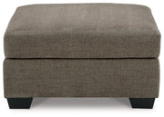 Mahoney Chocolate 2-Piece Sectional with Ottoman from Ashley - Lara Furniture