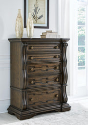 Maylee California King Upholstered Bed, Dresser, Mirror, Chest and Nightstand in Dark Brown - PKG017059