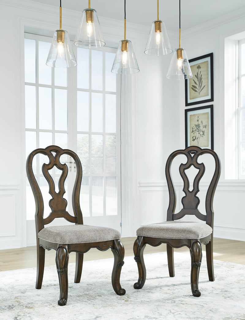 Maylee Dining Table and 10 Chairs with Storage in Dark Brown from Ashley - Lara Furniture