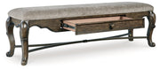 Maylee Dining Table and 4 Chairs and Bench with Storage in Dark Brown from Ashley - Lara Furniture