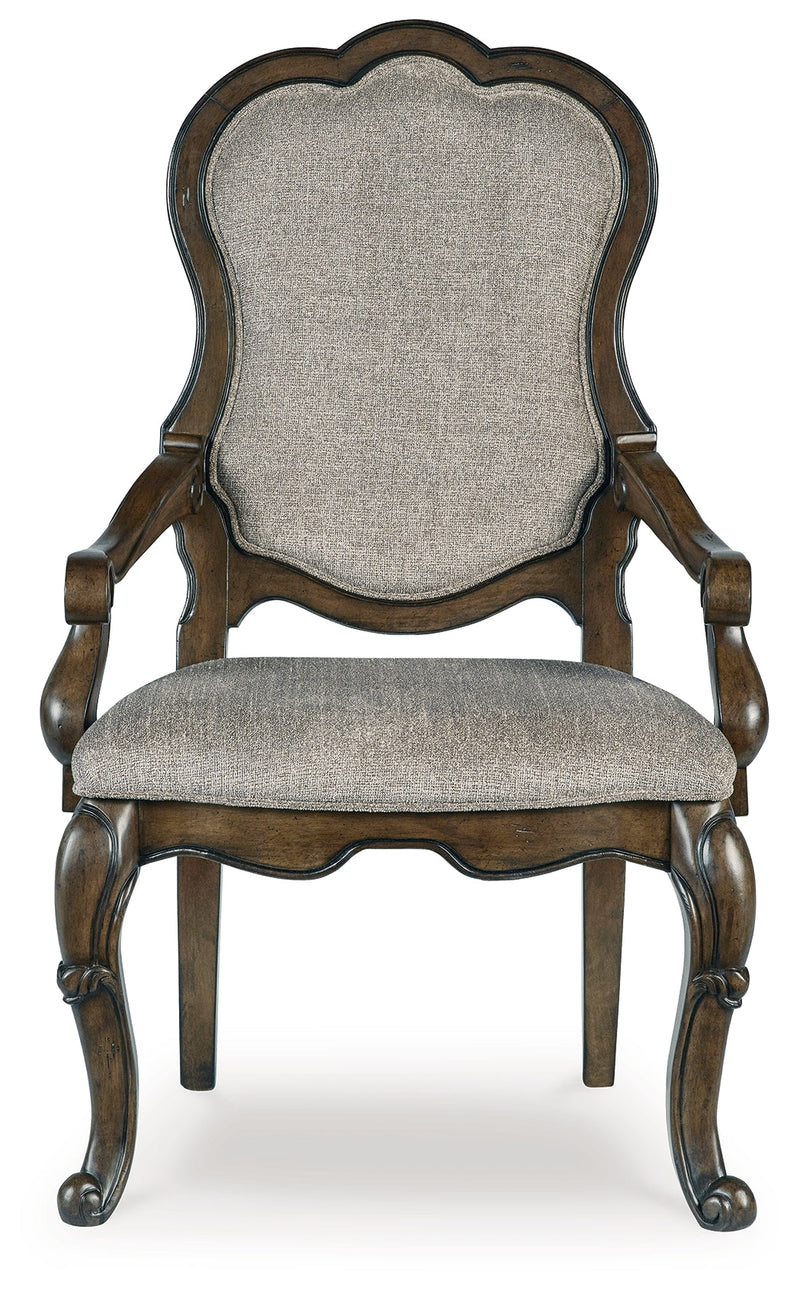 Maylee Dining Table and 8 Chairs with Storage in Dark Brown from Ashley - Lara Furniture