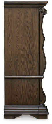 Maylee King Upholstered Bed, Dresser, Mirror and Chest in Dark Brown - PKG017049