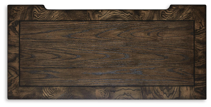 Maylee King Upholstered Bed, Dresser, Mirror and Chest in Dark Brown - PKG017049