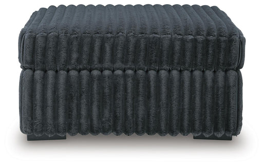 Midnight-Madness 4-Piece Sectional and Ottoman - 98105U5