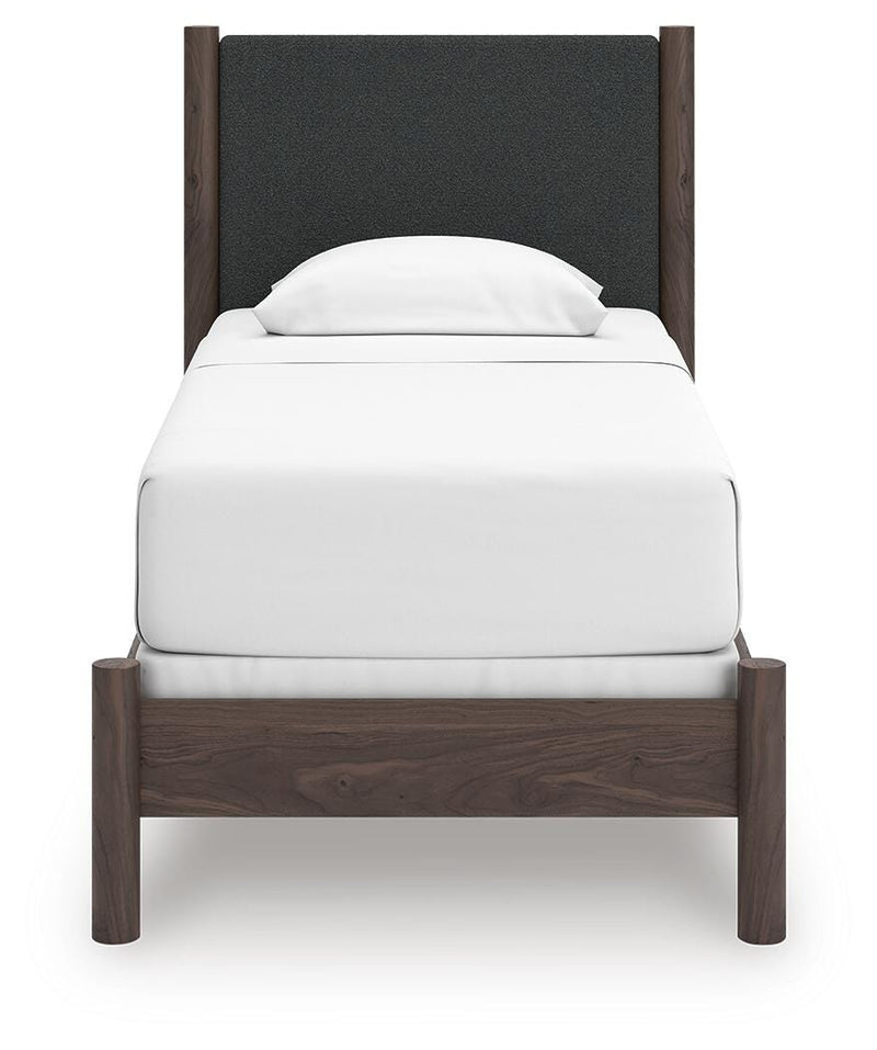 Pamytta Twin Upholstered Panel Bed, Dresser and Chest in Brown - PKG022771
