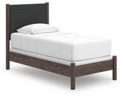 Pamytta Twin Upholstered Panel Bed, Dresser, Mirror and Nightstand in Brown - PKG022718