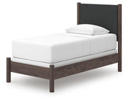 Pamytta Twin Upholstered Panel Bed, Dresser, Mirror, Chest and Nightstand in Brown - PKG022720