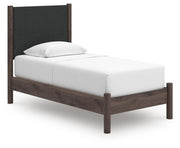 Pamytta Twin Upholstered Panel Platform Bed, Dresser, Mirror and Chest in Brown - PKG022683