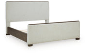 Radkin Burnished Brown California King Upholstered Panel Bed - PCB843B5
