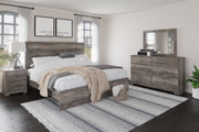 Ralinksi Gray King Panel Bed - Gate FurnitureKing Bed