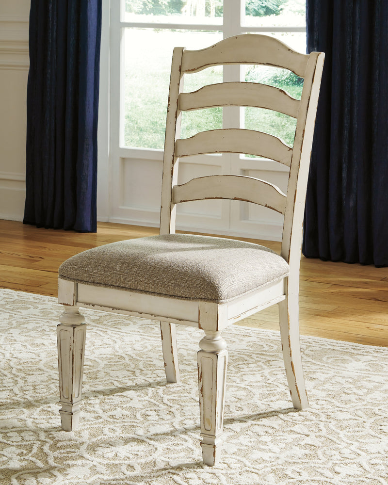 Realyn Chipped White 5-Piece Oval/Round Dining Table Set from Ashley - Lara Furniture
