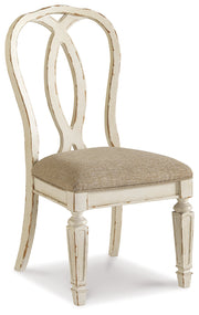 Realyn Chipped White Oval/Round Dining Table and 6 Ribbon Back Chairs from Ashley - Lara Furniture