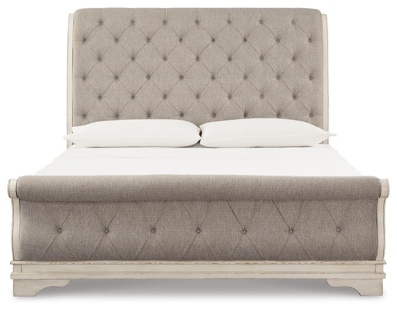 Realyn King Upholstered Sleigh Bed, Dresser and Nightstand - B743B108