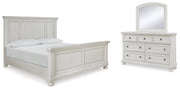 Robbinsdale California King Panel Bed with Mirrored Dresser in Antique White from Ashley - Lara Furniture