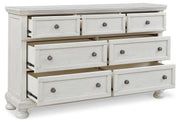 Robbinsdale California King Sleigh Bed with Storage with Mirrored Dresser in Antique White from Ashley - Lara Furniture