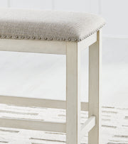 Robbinsdale Antique White Counter Height Dining Table and 6 Barstools and Bench with Storage from Ashley - Lara Furniture