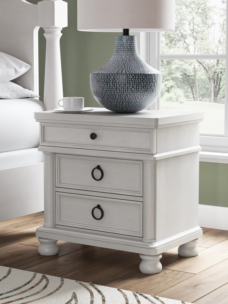 Rowlenstown King Poster Bed, Dresser, Mirror and Nightstand in Antique White - PKG023874
