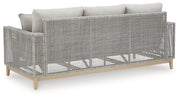 Seton Creek Outdoor Sofa and Loveseat with Coffee Table in Gray from Ashley - Lara Furniture
