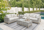 Seton Creek Outdoor Sofa and Loveseat with Coffee Table in Gray from Ashley - Lara Furniture