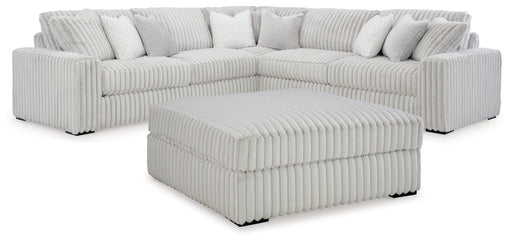 Stupendous Alloy 3-Piece Sectional with Ottoman from Ashley - Lara Furniture