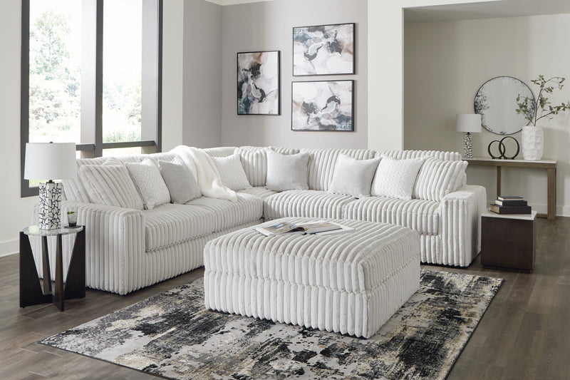 Stupendous Alloy 3-Piece Sectional with Ottoman from Ashley - Lara Furniture