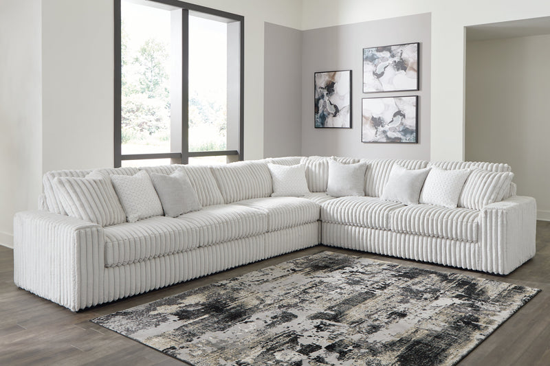 Stupendous Alloy 4-Piece Sectional with Ottoman from Ashley - Lara Furniture