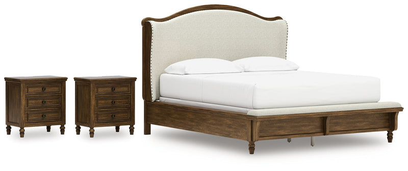 Sturlayne California King Upholstered Panel Bed with 2 Nightstands in Brown from Ashley - Lara Furniture