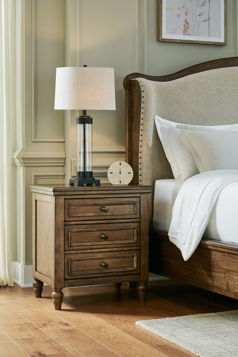 Sturlayne California King Upholstered Panel Bed with Mirrored Dresser and 2 Nightstands in Brown from Ashley - Lara Furniture