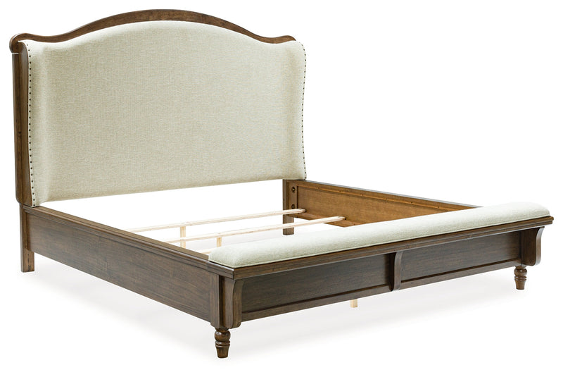 Sturlayne California King Upholstered Panel Bed with Mirrored Dresser and 2 Nightstands in Brown from Ashley - Lara Furniture