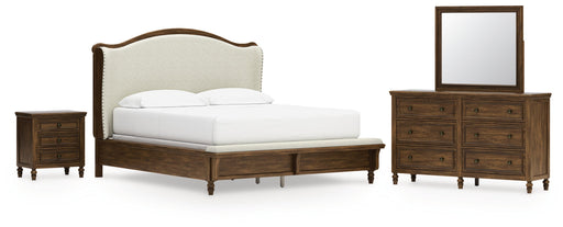 Sturlayne California King Upholstered Panel Bed with Mirrored Dresser and Nightstand in Brown from Ashley - Lara Furniture