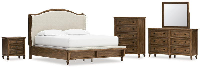 Sturlayne California King Upholstered Panel Bed with Mirrored Dresser, Chest and Nightstand in Brown from Ashley - Lara Furniture