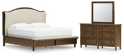 Sturlayne California King Upholstered Panel Bed with Mirrored Dresser in Brown from Ashley - Lara Furniture