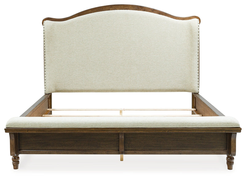Sturlayne California King Upholstered Panel Bed with Mirrored Dresser in Brown from Ashley - Lara Furniture