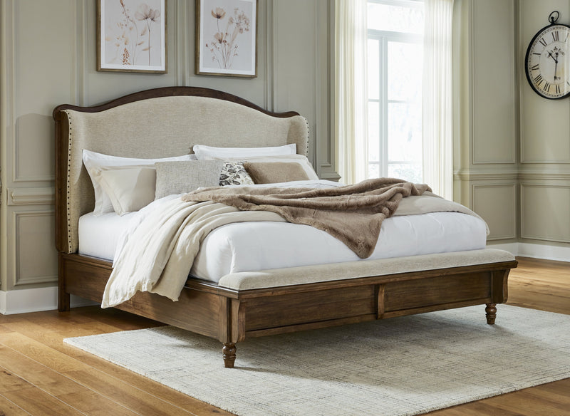 Sturlayne King Upholstered Panel Bed with Mirrored Dresser and 2 Nightstands in Brown from Ashley - Lara Furniture