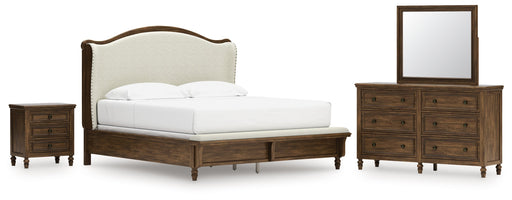Sturlayne King Upholstered Panel Bed with Mirrored Dresser and Nightstand in Brown from Ashley - Lara Furniture