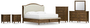 Sturlayne King Upholstered Panel Bed with Mirrored Dresser, Chest and 2 Nightstands in Brown from Ashley - Lara Furniture