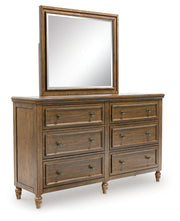 Sturlayne King Upholstered Panel Bed with Mirrored Dresser in Brown from Ashley - Lara Furniture